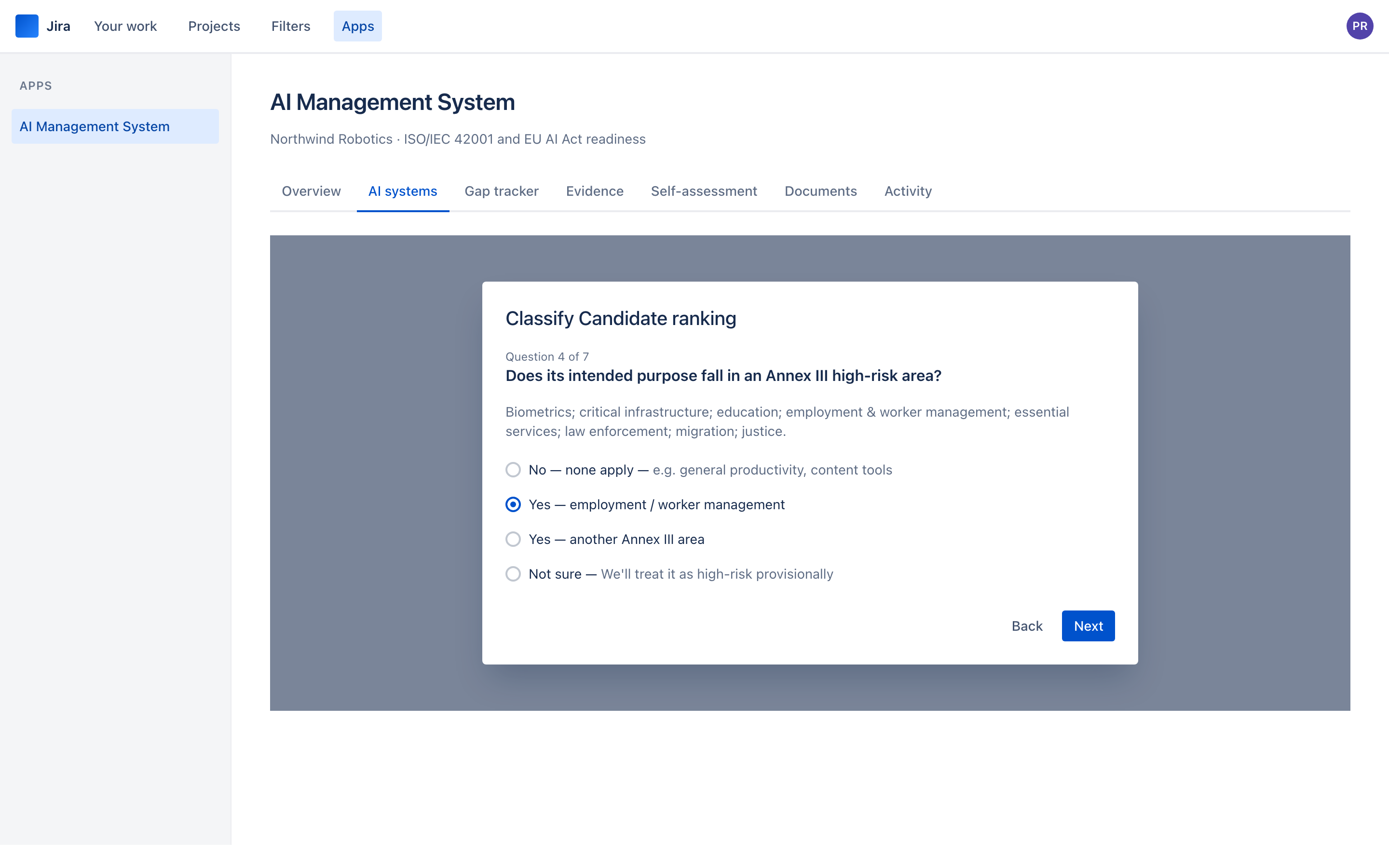 The classification wizard asking whether a system's intended purpose falls in an Annex III high-risk area, with four options and explanatory help text.